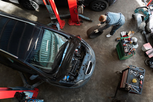 a picture showing a car shop and service