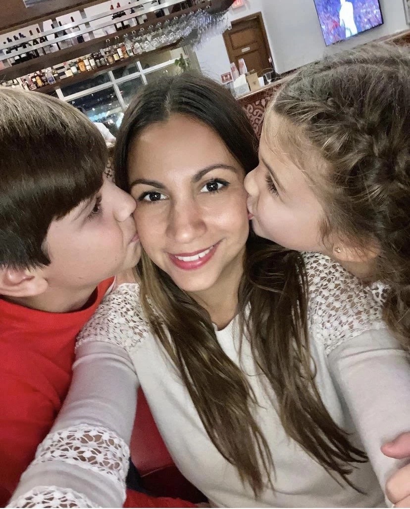 a picture of Maria with her kids