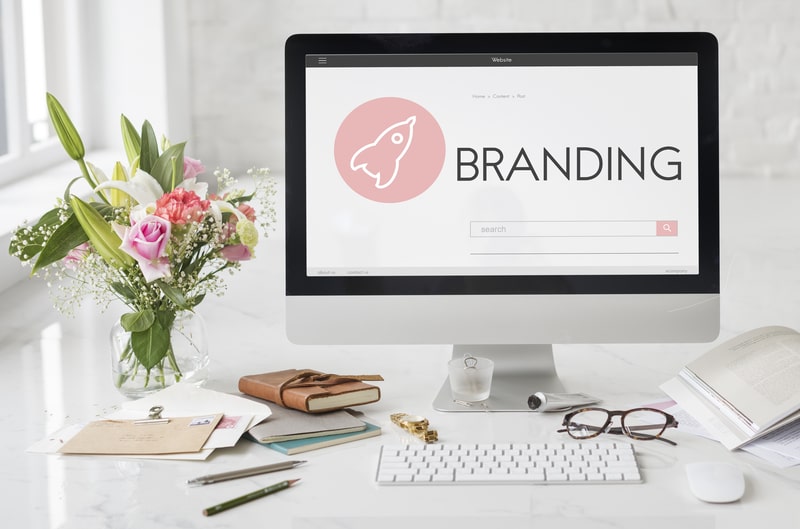 Picture showing someone creating a brand image for their online business