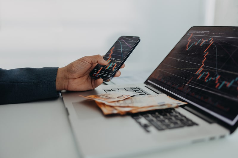 Picture showing a man losing money on stock market