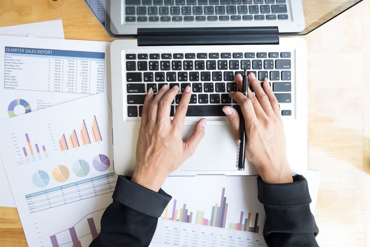 Picture of a man working on a laptop