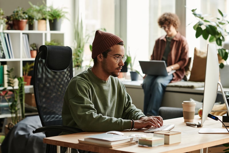 Picture of a man working on a computer