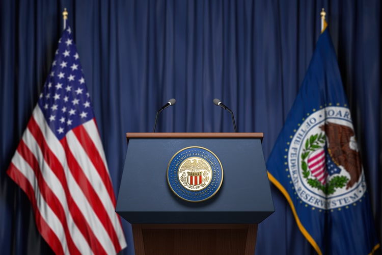 Picture of federal reserve system press conference with flags