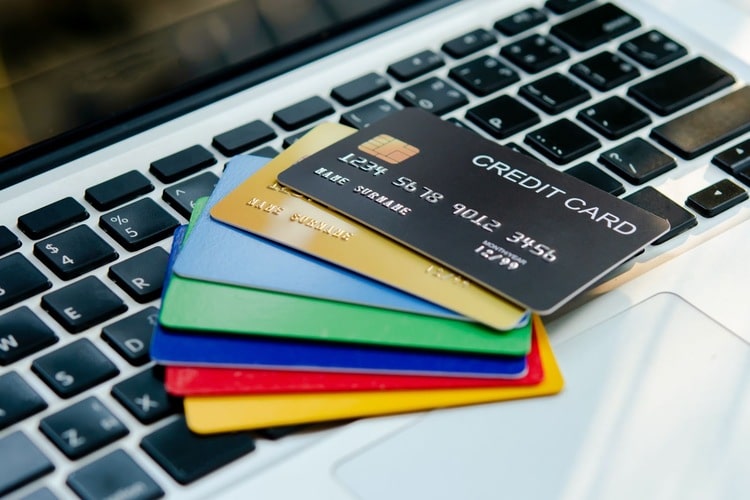 Photo of credit cards on a laptop